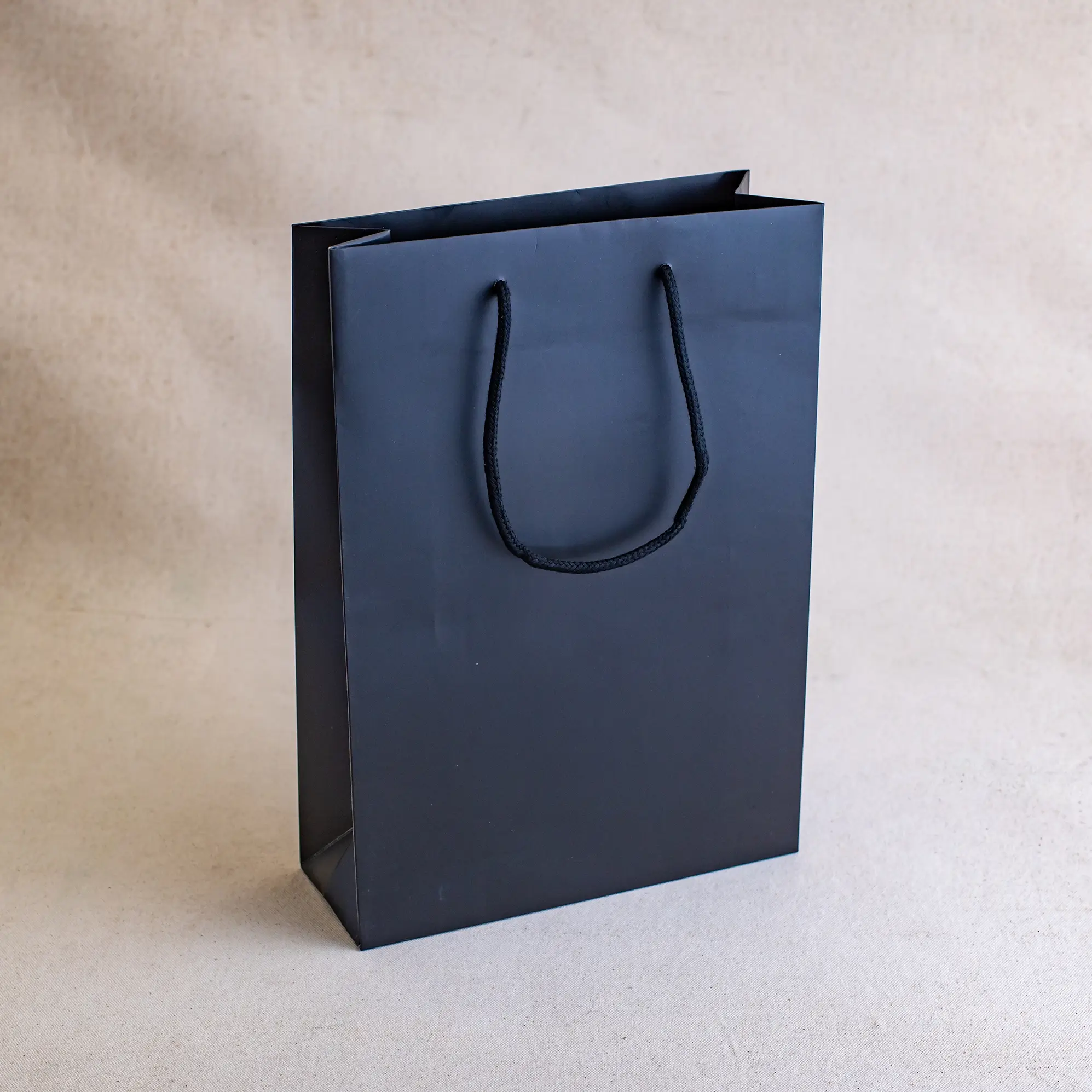 Show details for FSC® Black Luxury Laminated Rope Handle Paper Bags - Plain